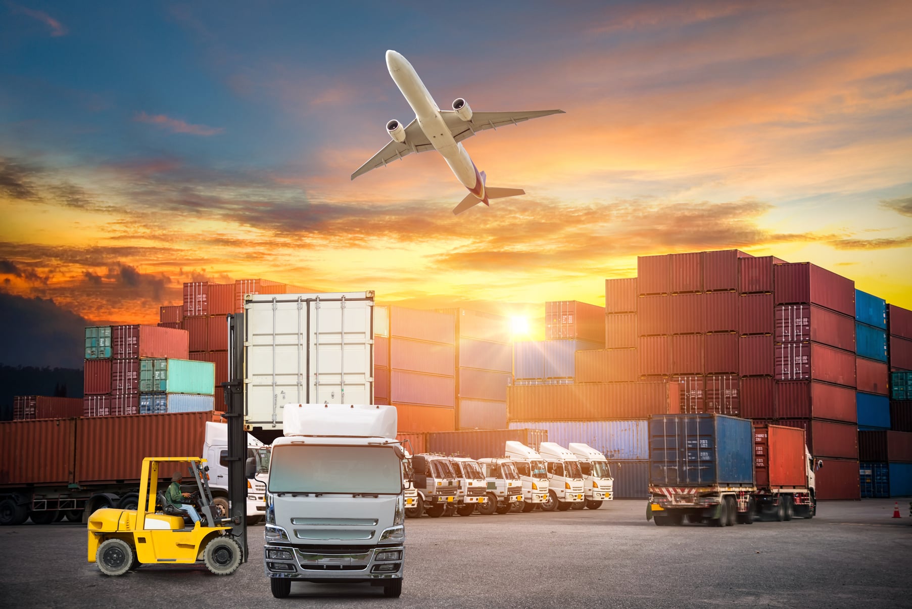 forklift handling container box loading to truck in import export logistic, Business logistics concept